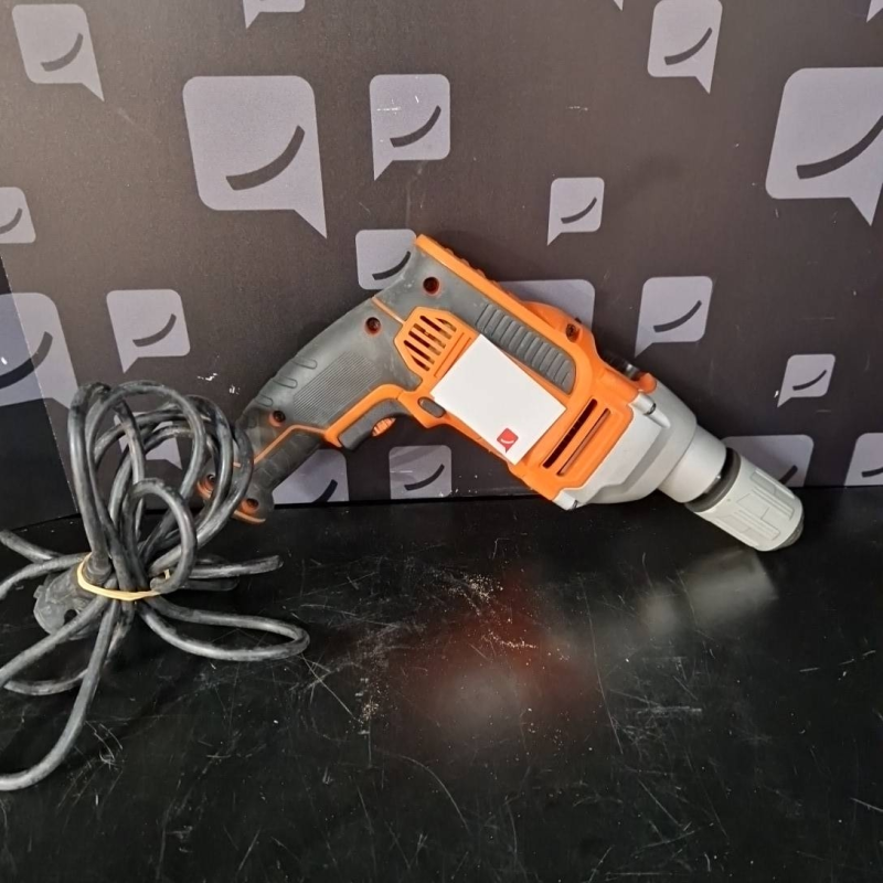 Perceuse  Black Decker  KR705 poignée +boite acc  