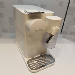 machine a café delonghi...